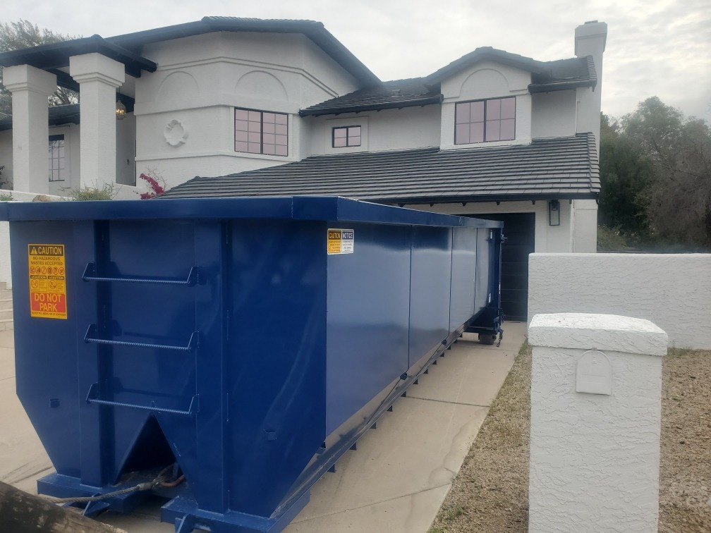 30 yard roll off dumpster in driveway